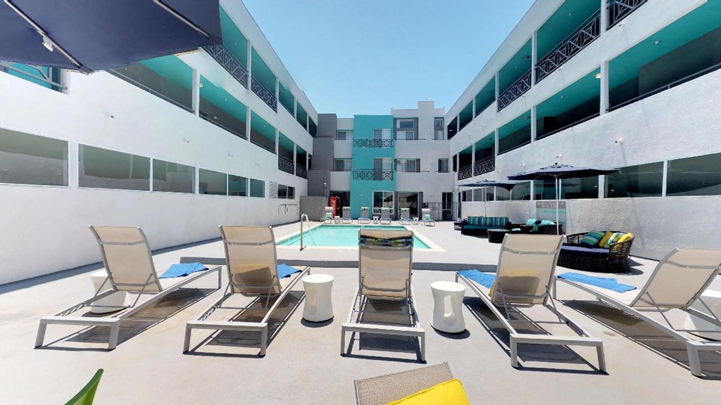 5015 Clinton Apartments pool area and lounge chairs