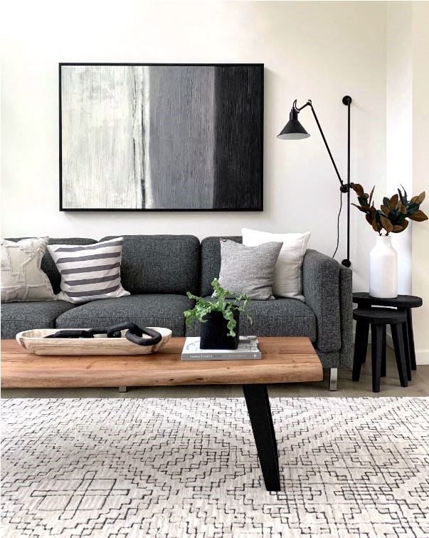 a living room with a couch and a coffee table