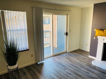 Silver Shadow Apartments Living Room with Balcony