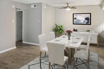 Hidden Oaks Apartment Homes dining area with decor - Photo Gallery 3