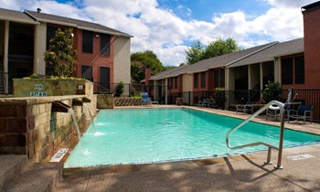 Hidden Oaks Apartment Homes pool area - Photo Gallery 4