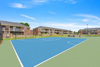 basketball court at the whispering winds apartments in pearland, tx