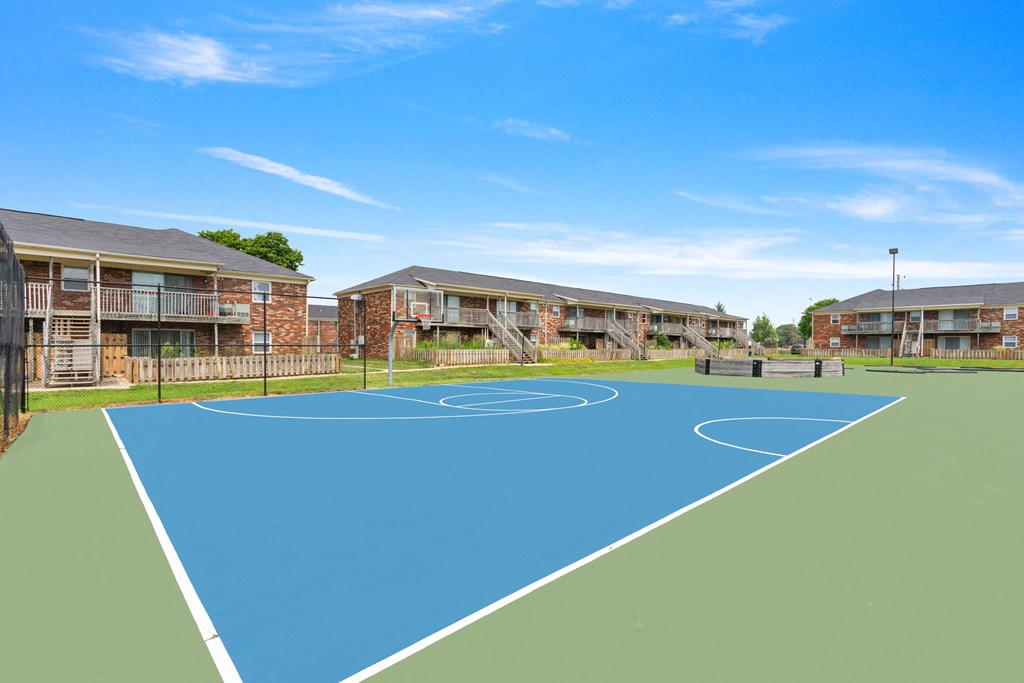 basketball court at the whispering winds apartments in pearland, tx