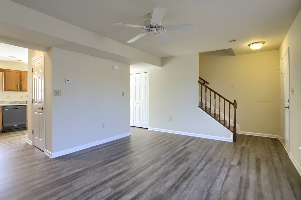 Mechanicsburg Apartments | Rockledge Townhomes |  a living room with hardwood floors and white walls