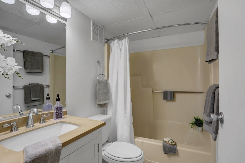 Apartments in Williamsport | Woodland Park |a bathroom with a bathtub and a sink