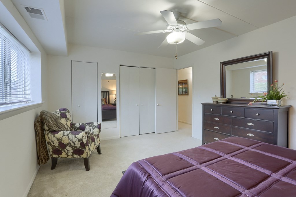 Apartments in Harrisburg | Twin Lakes Apartments | a bedroom with a bed and a dresser