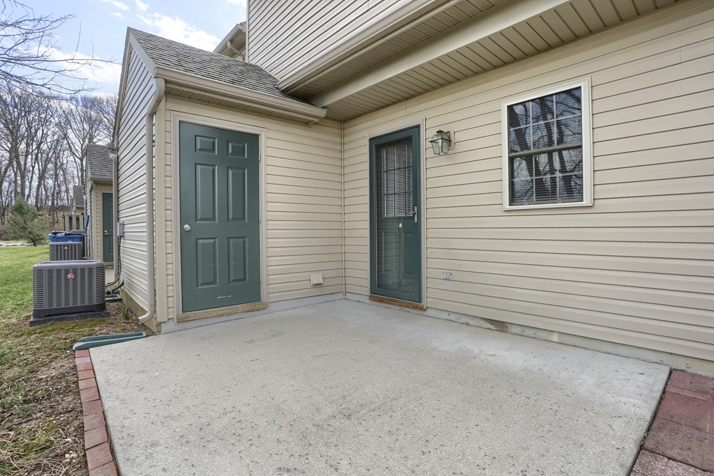 Mechanicsburg Apartments | Rockledge Townhomes | back patio with storage