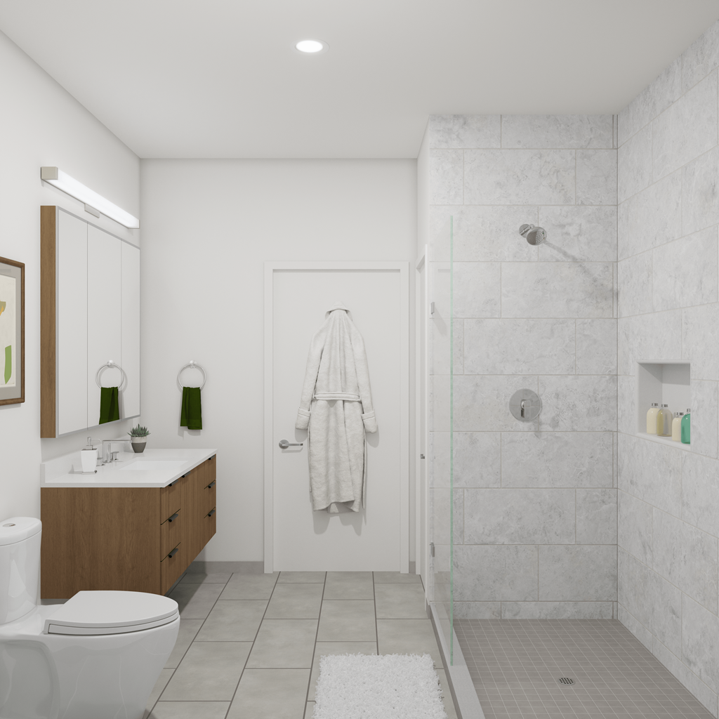 Apartments in Lancaster | a white bathroom with a shower and a toilet and a sink