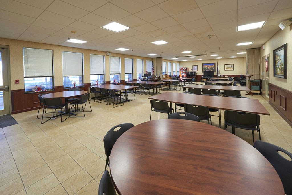 a dining room filled with tables and chairs