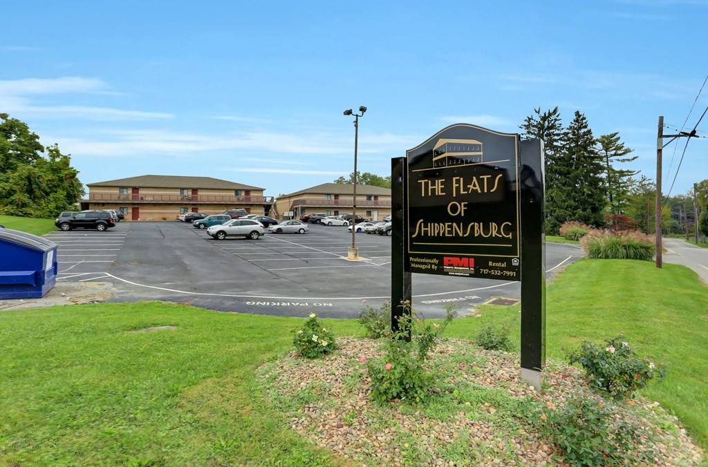 the faith of america church sign in front of a parking lot