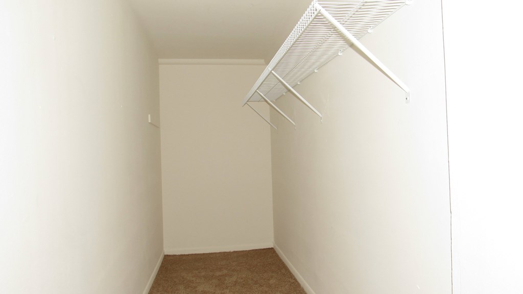 A white wall with a white ceiling and a white floor.