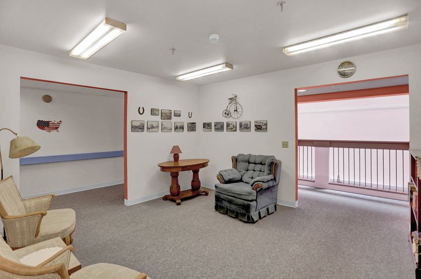a living room with a couch and a table