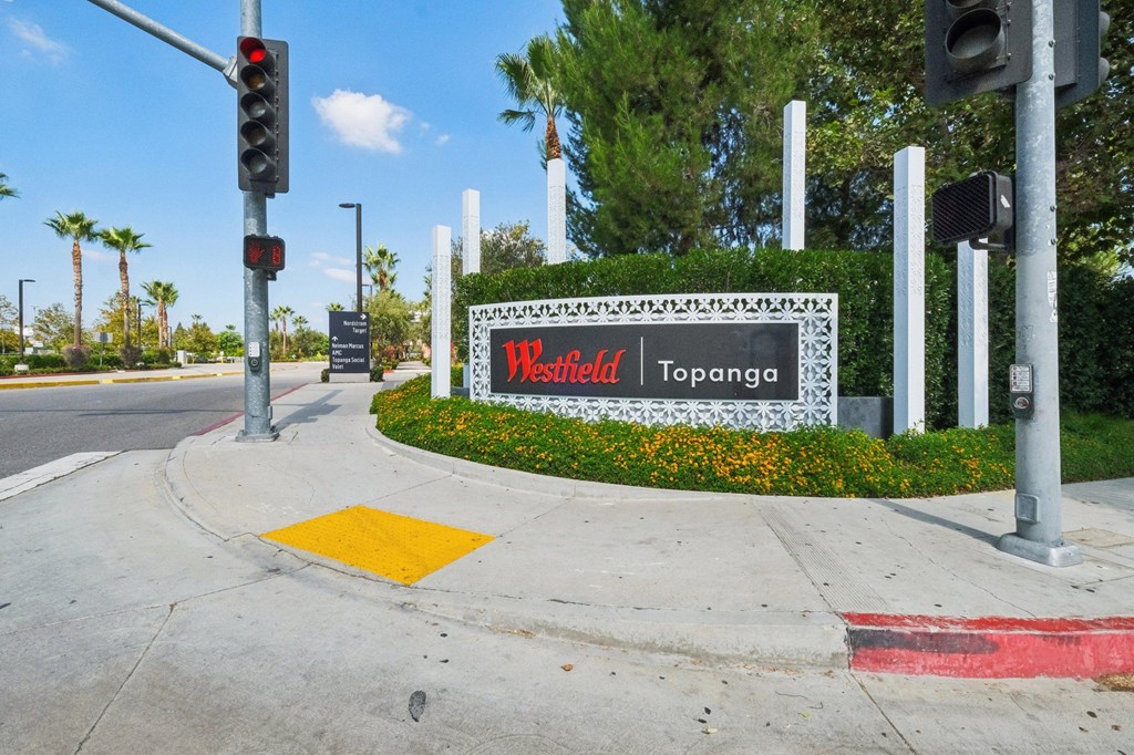 A sign for a hotel named "W Hotel" is visible in the foreground of the image.