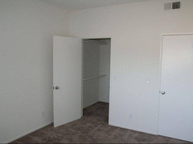 Walk in closet with storage space