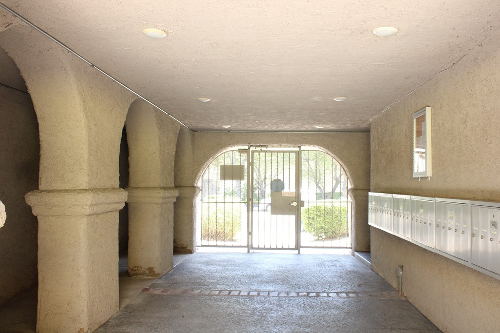 the inside of a building with an open door