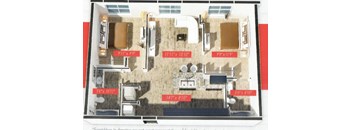 A floor plan of a house with a living room, dining room, kitchen, and two bedrooms.