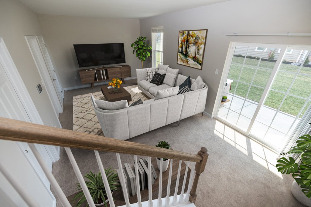 an overhead view of a living room with a couch and a tv