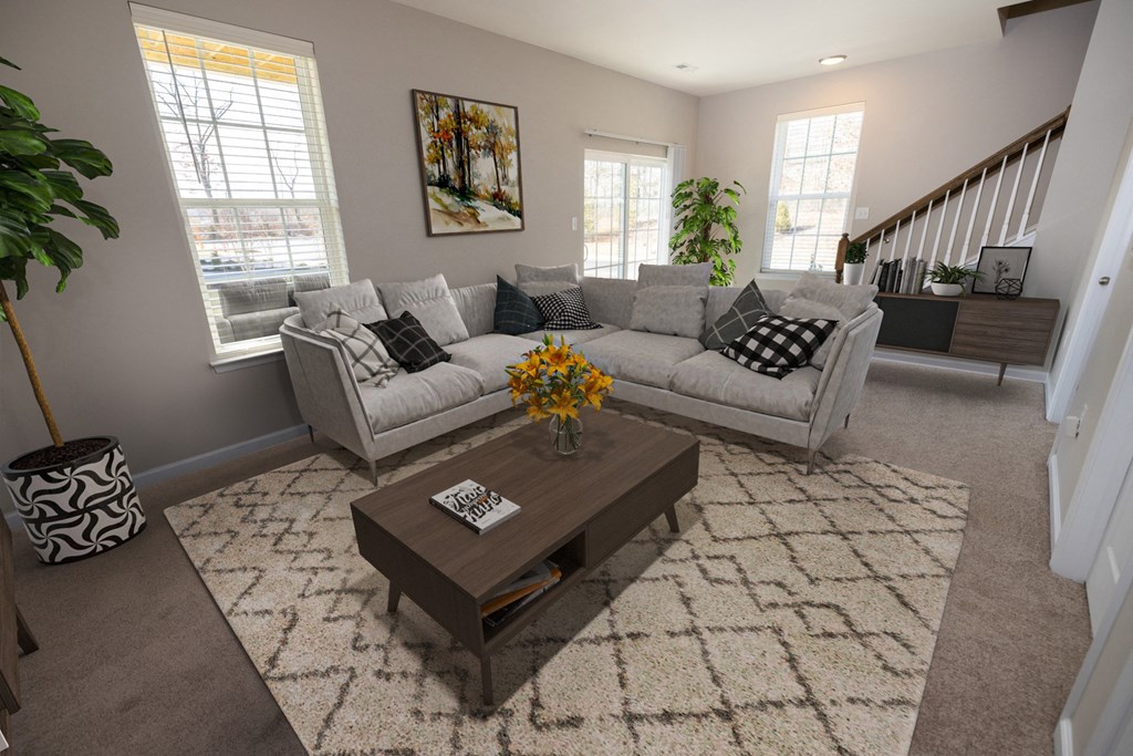 a living room with a couch and a coffee table