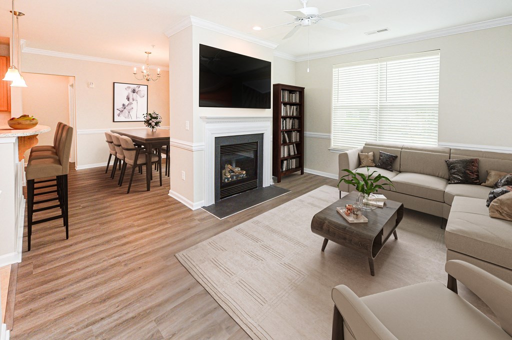 a living room with a couch and a fireplace
