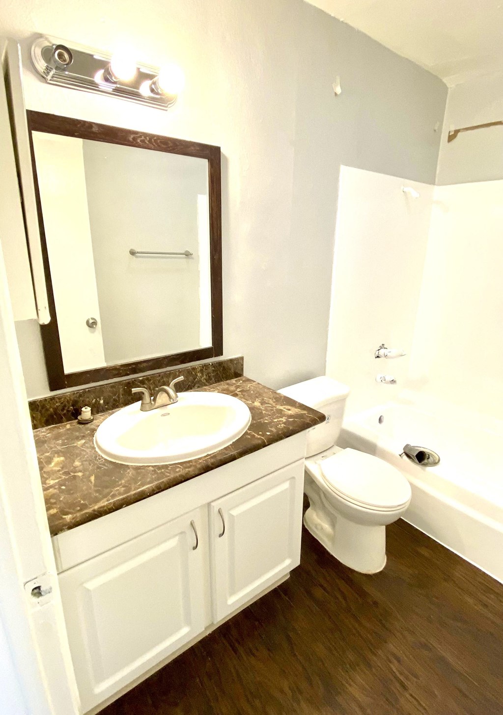 Bathroom vanity sink and mirror full bathtub and shower  at Parc Meridien, Los Angeles