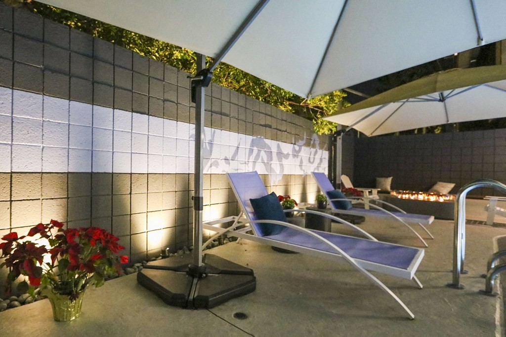 Pool side at night at Westwood Riviera Apartments, Los Angeles