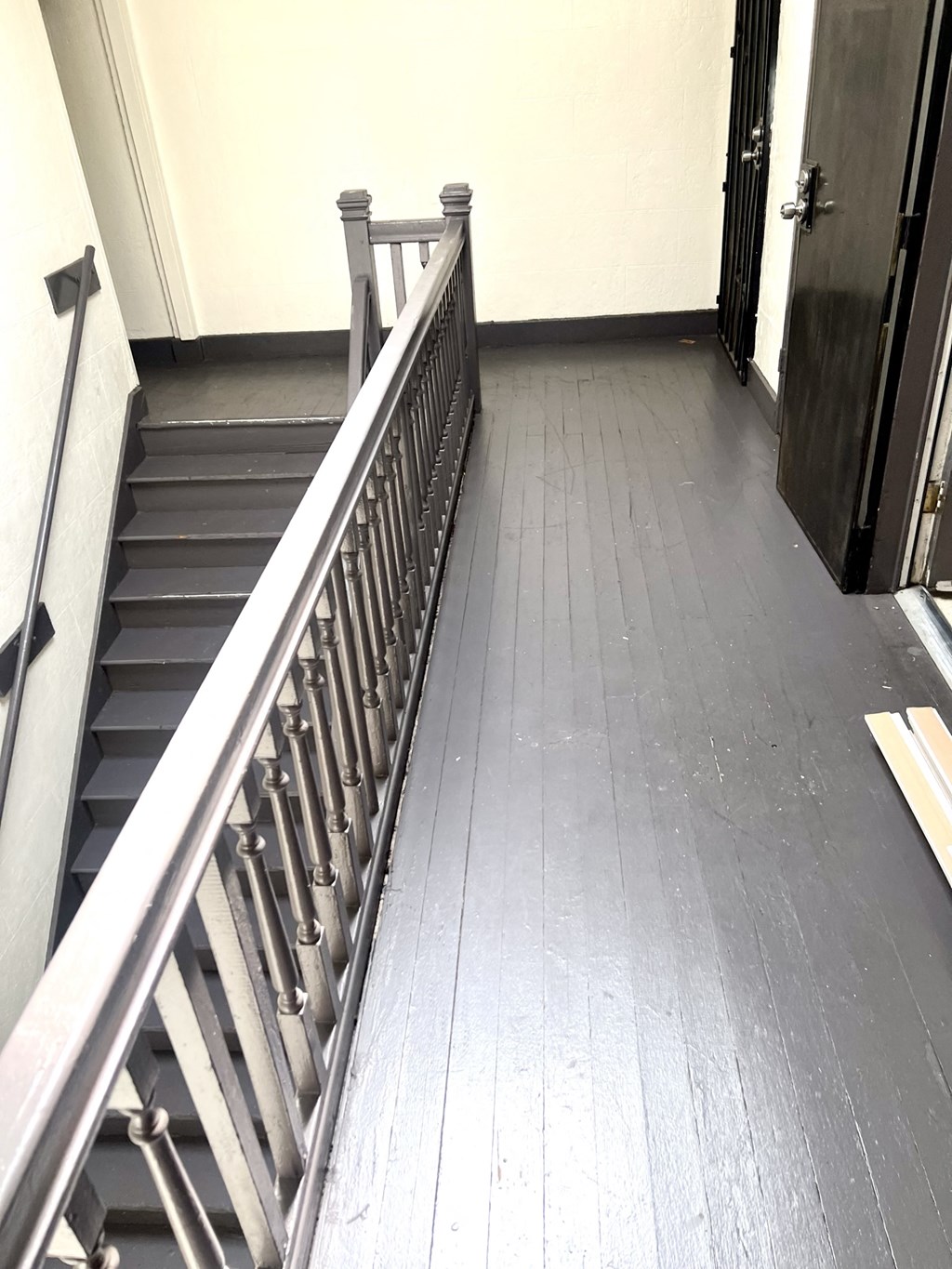 Interior walk way landing to enter apartment homes