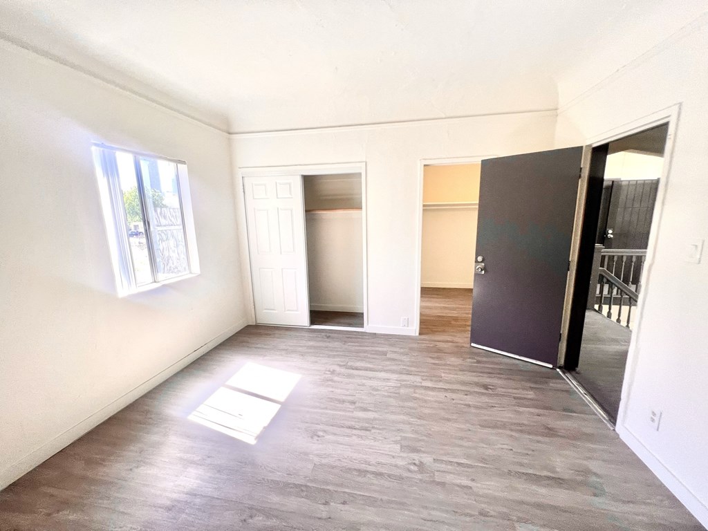 Living space with closet and window