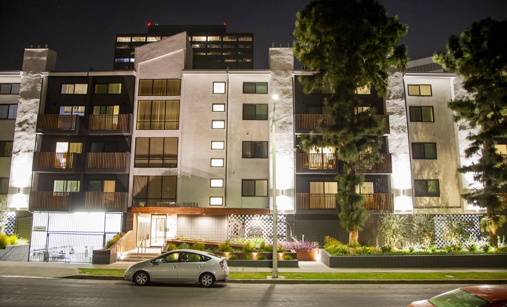 Exterior night view of building at Westwood Riviera Apartments, Los Angeles, 90024