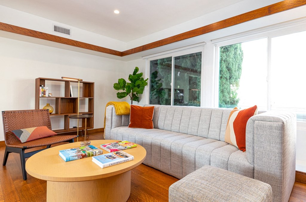 a living room with a couch and a table