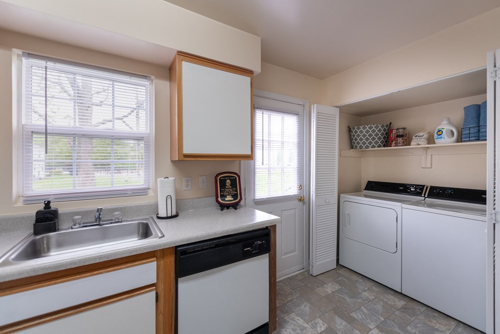 Kitchen with natural light and in-unit washer/dryer