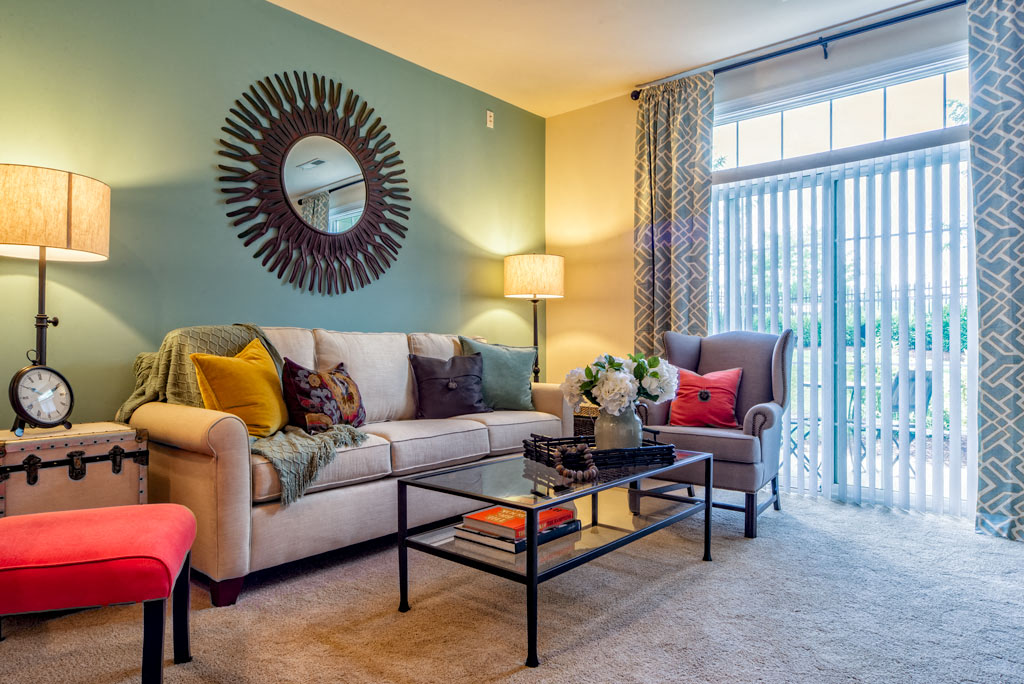 a living room with a couch and a table