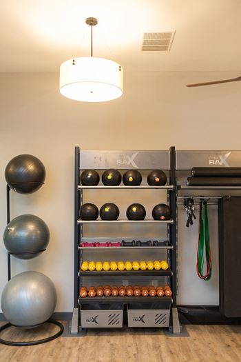 a rack of balls in a gym with weights on it at The Yards at Malvern, Malvern, Pennsylvania