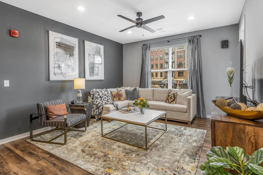 Unwind and Recharge in our Cozy Living Rooms. at Meeder Flats Apartment Homes, Cranberry Township, Pennsylvania