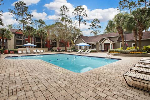 Swimming Pool With Lounge Chairs at Timberwalk at Mandarin Apartment Homes, Jacksonville