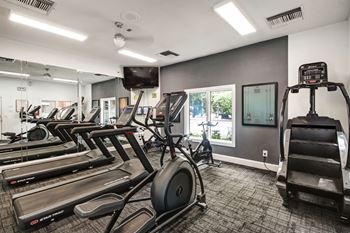 the gym is equipped with cardio equipment and weights at Timberwalk at Mandarin Apartment Homes, Florida, 32257