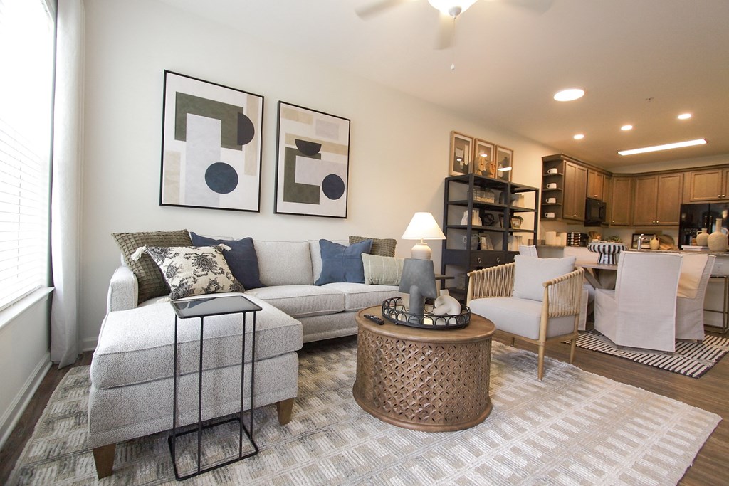 a living room with a couch and a table  at Carillon Woods, Millsboro