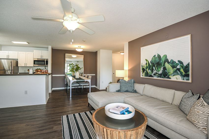 Living Room With Kitchen Living Room With Kitchen at Champions Walk Apartment Homes, Bradenton, FL - Photo Gallery