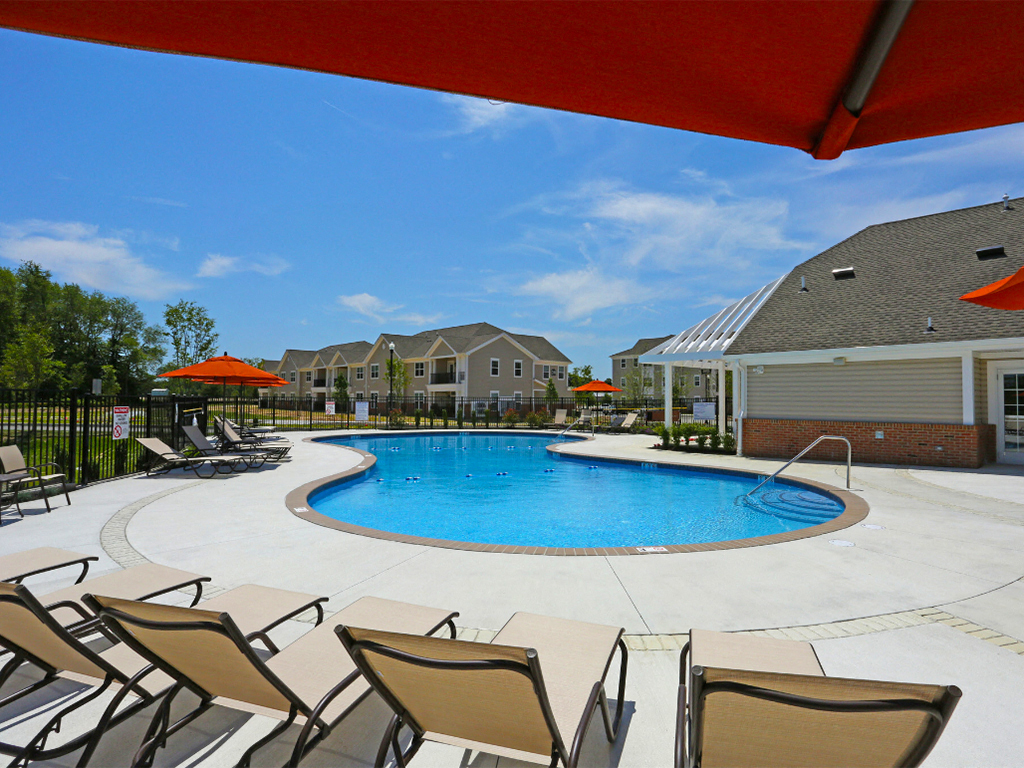 Loungers in front of sparkling pool  at Barclay Glen Apartments, New Jersey, 08094