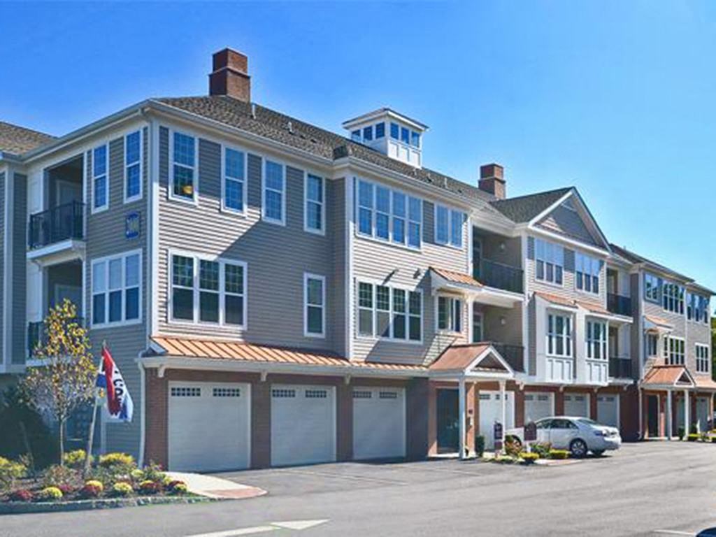a large building with a car parked in front of it