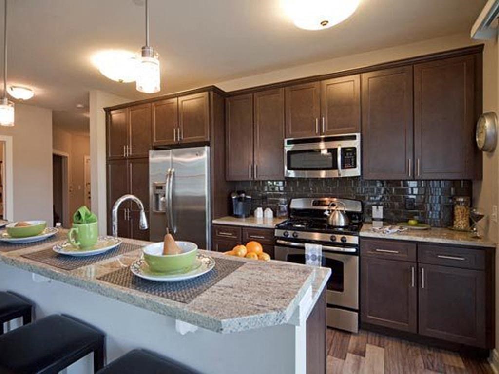 a kitchen with a granite counter top