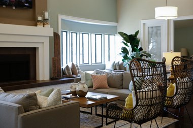 Living Area With Fireplace at Flagler Pointe Apartment Homes, St. Petersburg, 33712 - Photo Gallery 4