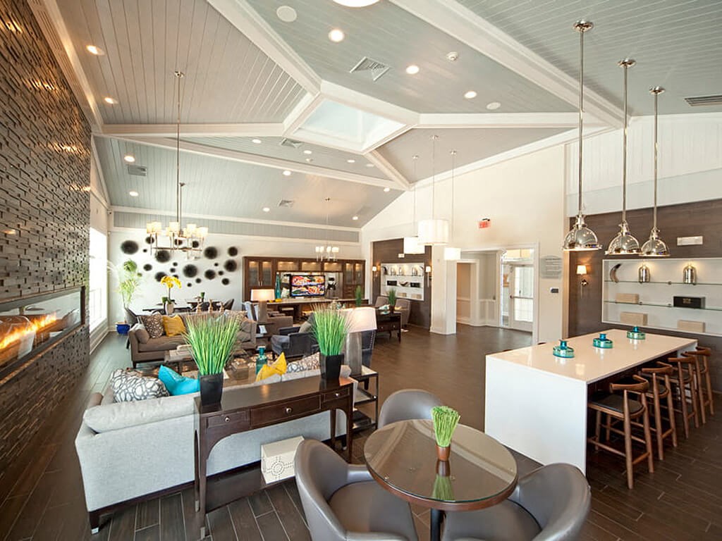 Large clubhouse with seating, a counter and dining tables  at Barclay Glen Apartments, New Jersey, 08094