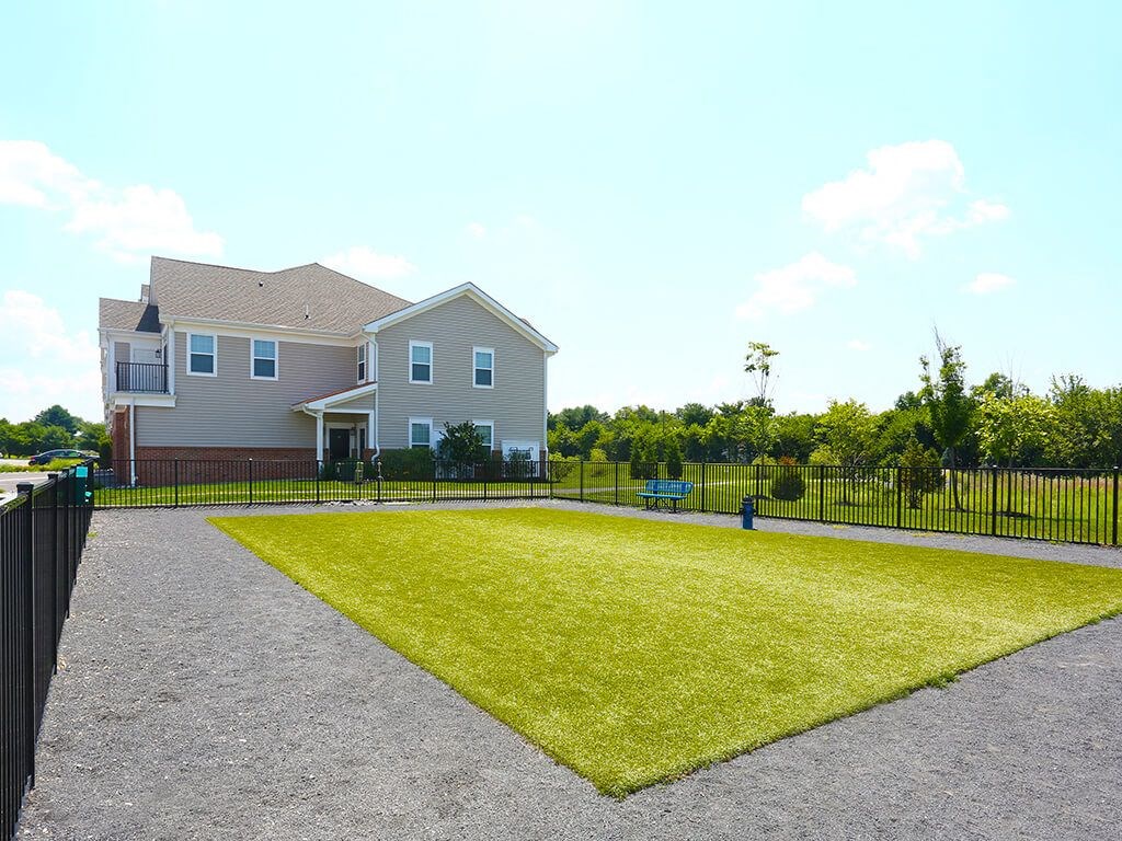 Large fenced in grass dog park  at Barclay Glen Apartments, Williamstown, NJ