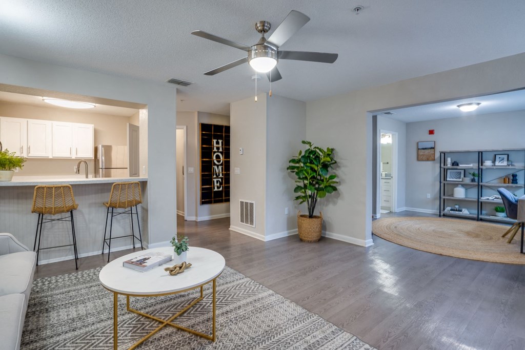 Living Room With Kitchen  at The Monroe Apartment Homes, Tallahassee, 32303