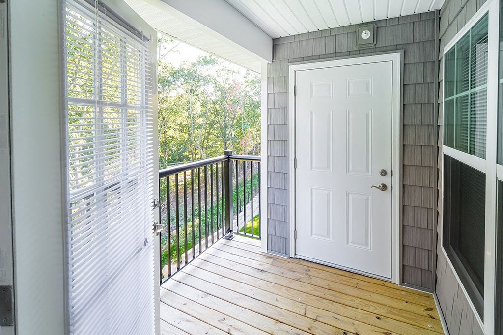 the entrance to a porch with a white door at Merion Stratford Apartment Homes, Stratford