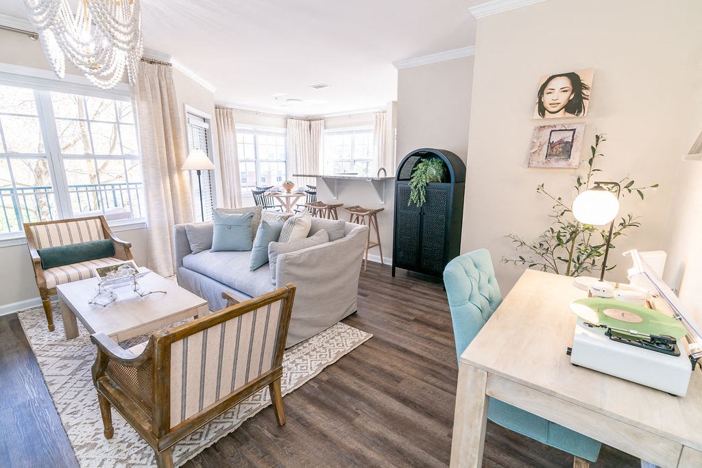 a living room with a couch and a table at The Ledges Apartment Homes, Groton, CT, 06340