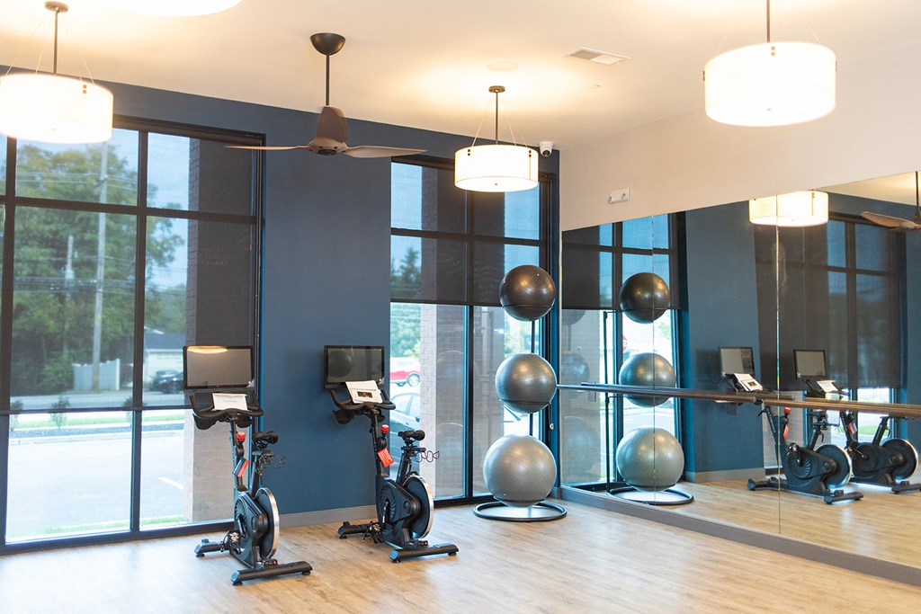 a fitness room with weights and balls and mirrors at The Yards at Malvern, Malvern, PA