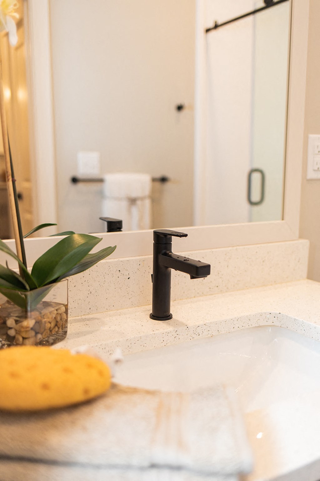 a bathroom sink with a black faucet and a banana at The Yards at Malvern, Malvern, PA
