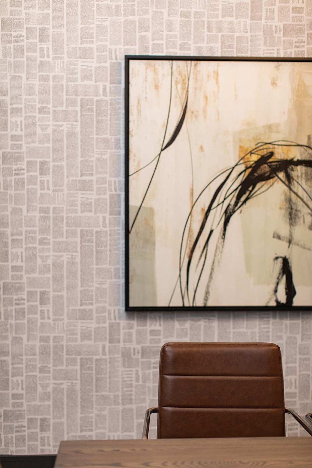 a room with a chair and a painting on the wall at The Yards at Malvern, Malvern, PA