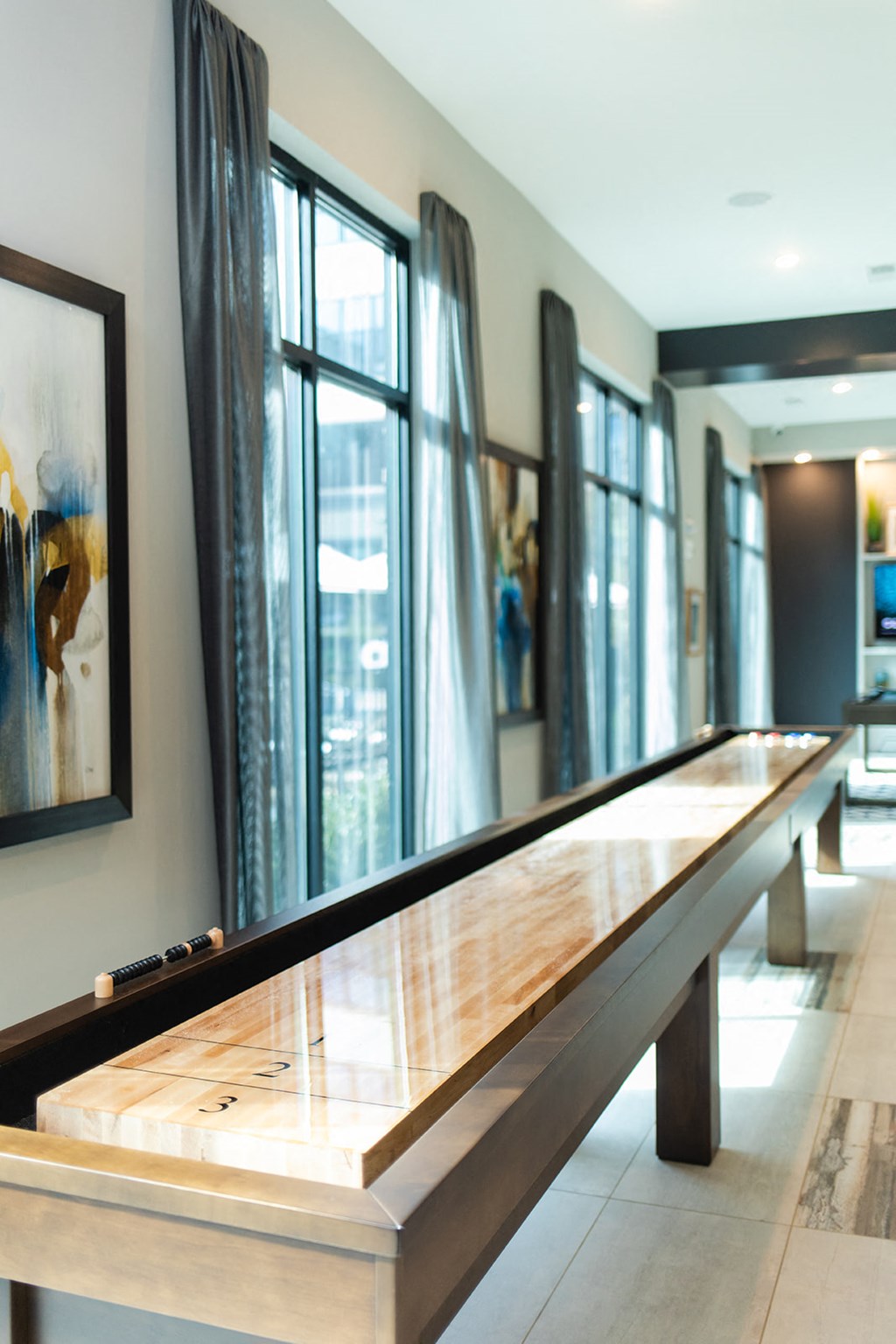 a shuffleboard table in the lobby of a building at The Yards at Malvern, Malvern, PA